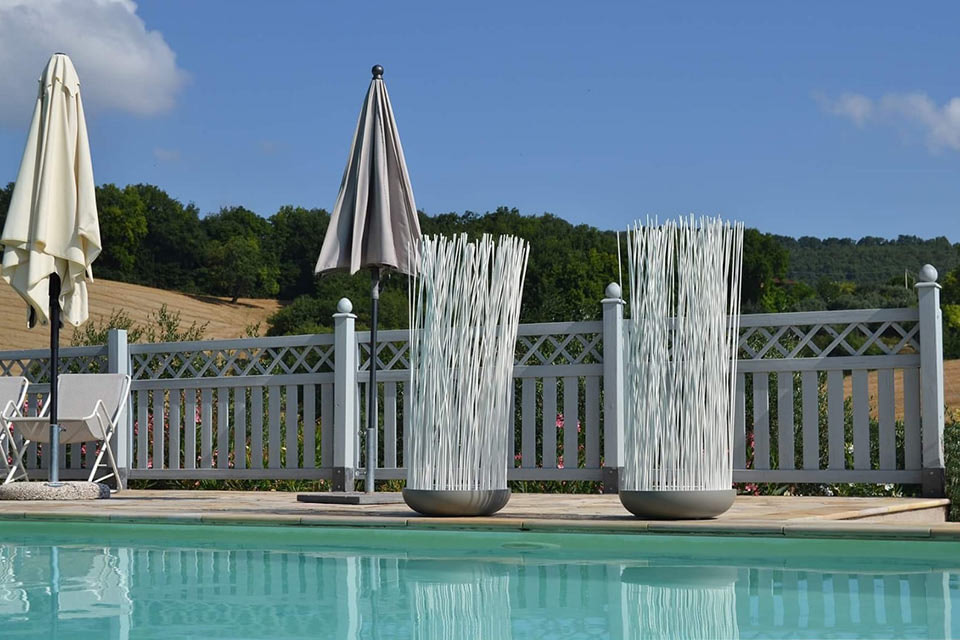 Outdoor lighting: how to illuminate the poolside. Don't Touch by Karman